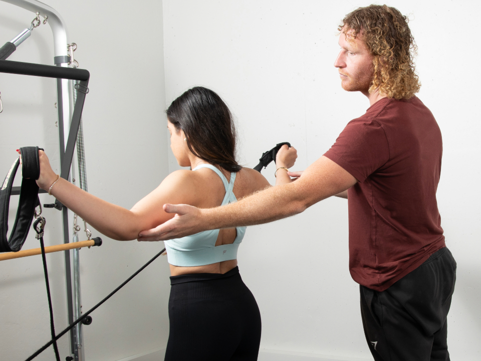 Teachers providing personal sessions to new members who want to join Reformer Pilates classes in Gibraltar.